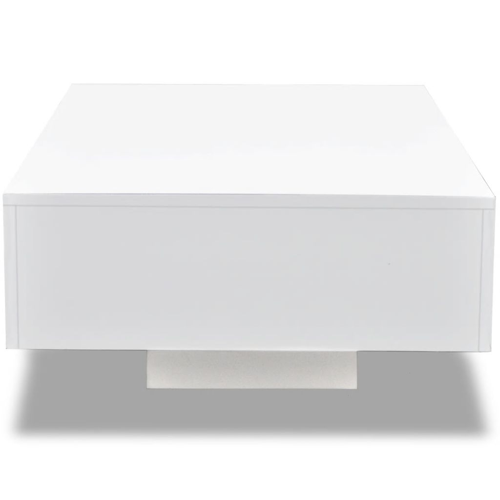 White rectangular object with a clear plastic cover on a white background