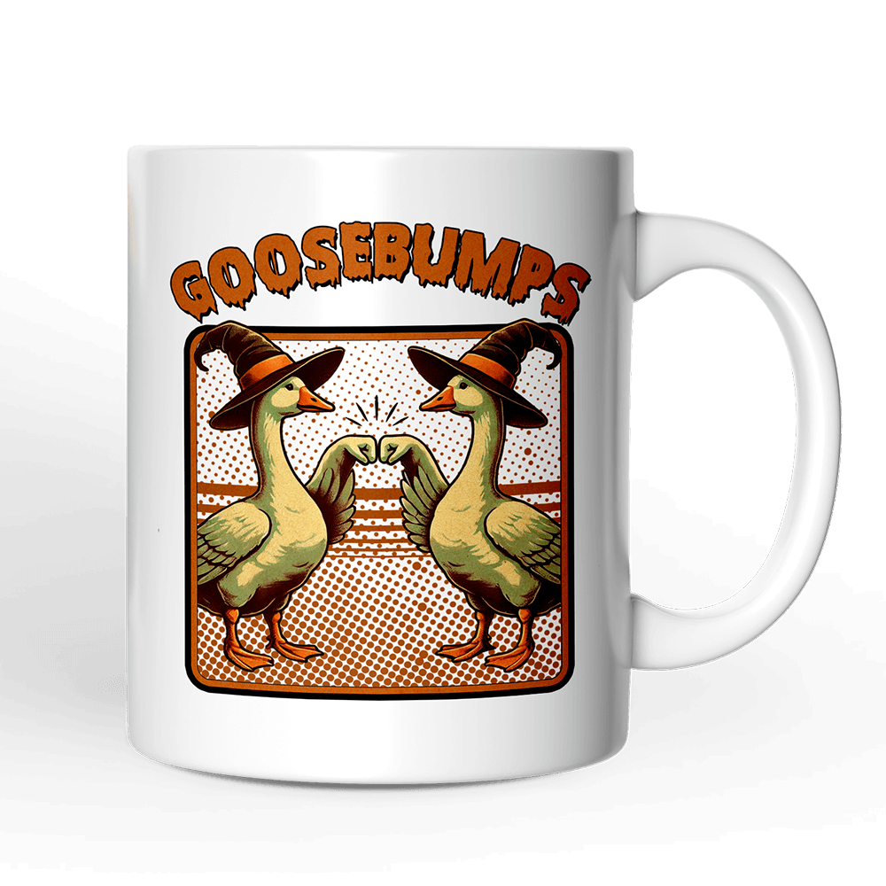 White mug with 'Goosebumps' design featuring two ducks in witch hats on a black background