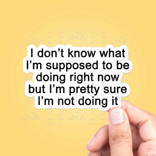 Hand holding a piece of paper with text on a yellow background