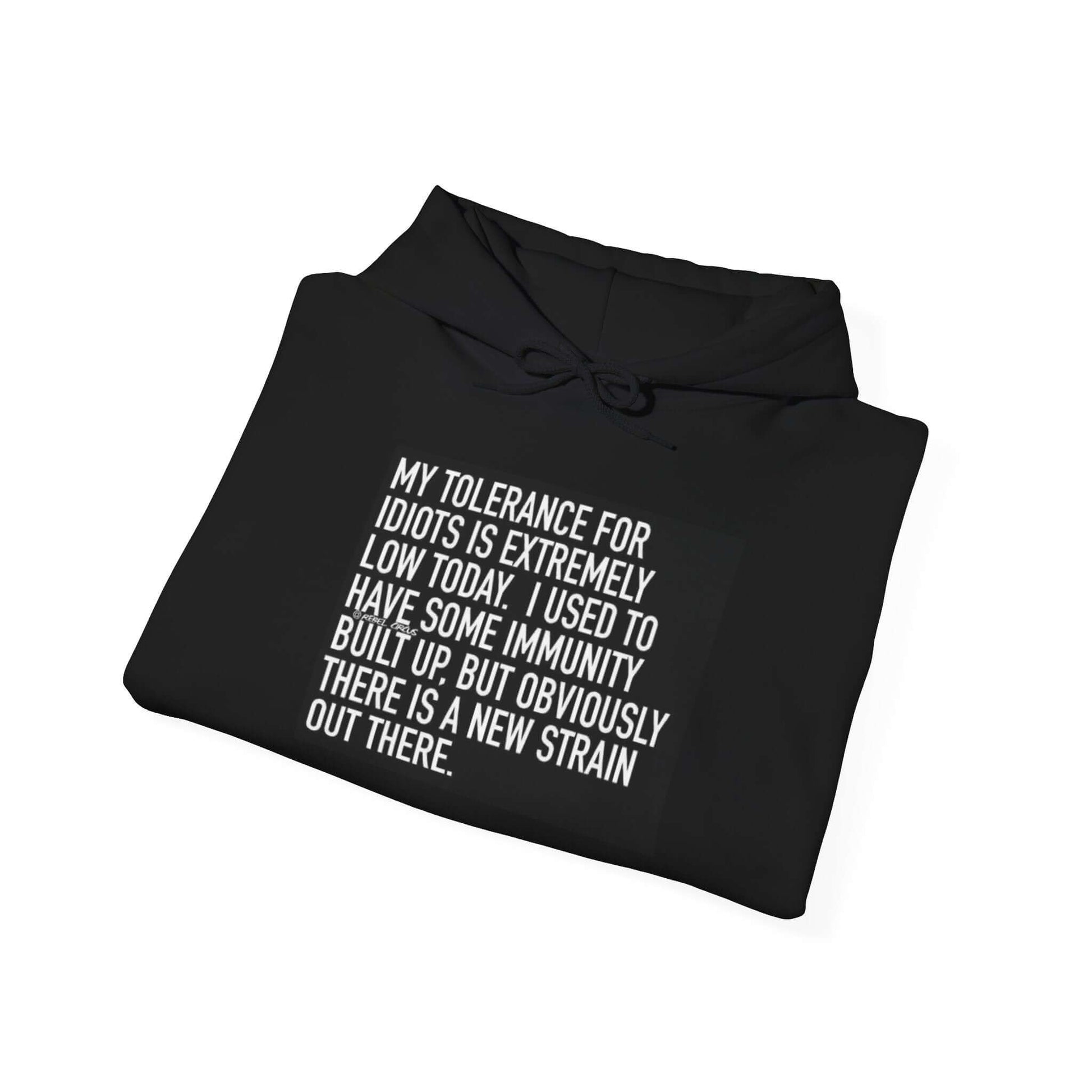 Folded black hoodie with white text on a white background