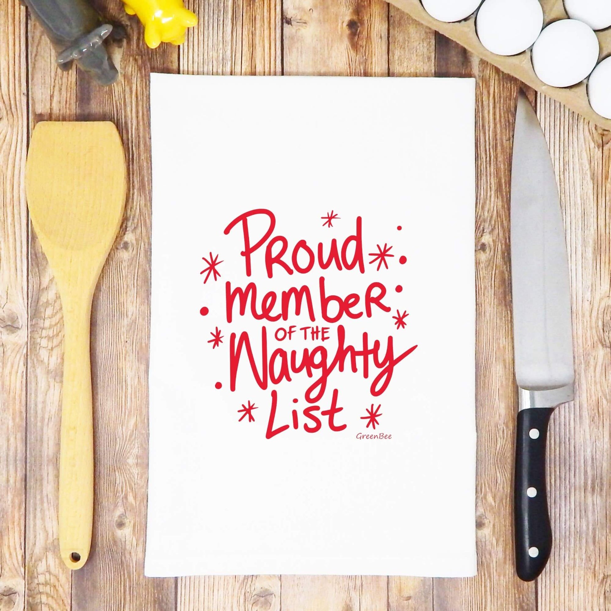 Naughty List Christmas Towel | Tea Towel | Kitchen Tea Towel featuring 'Proud Member of the Naughty List' in red text.