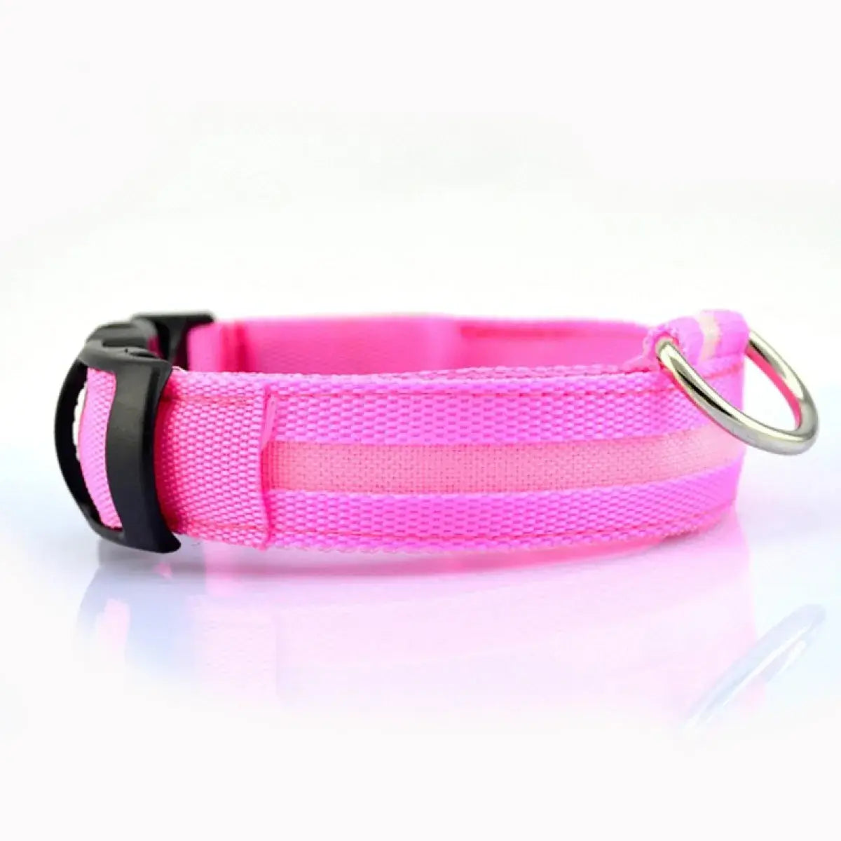 Pink dog collar with a metal ring on a white background