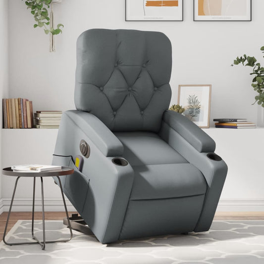 Gray recliner chair in a living room setting with a side table and decor.