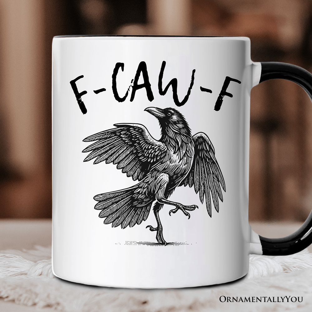 Mug with a crow illustration and 'F-CAW-F' text on a blurred background