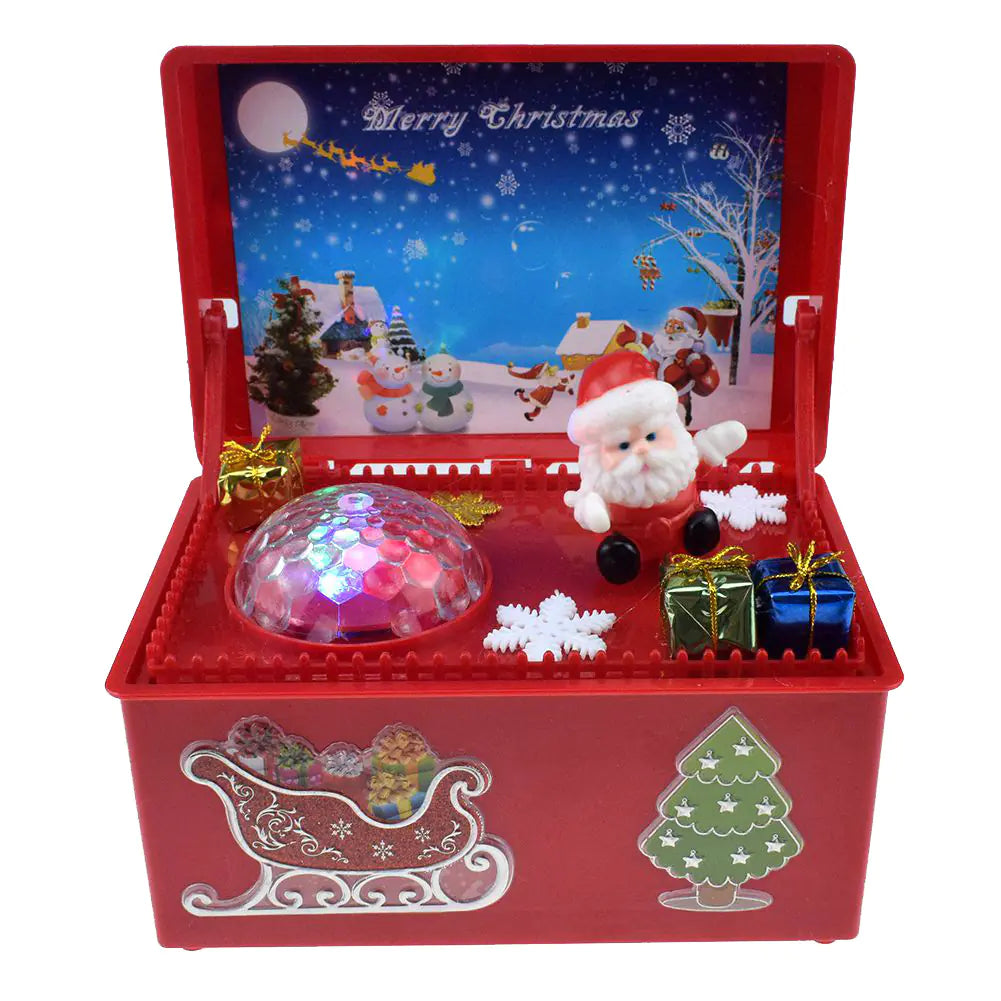 Red Christmas-themed music box with animated scenes and Santa Claus figure.