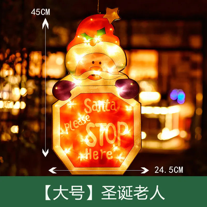 Decorative sign with Santa Claus design and LED lights, showing dimensions and text.