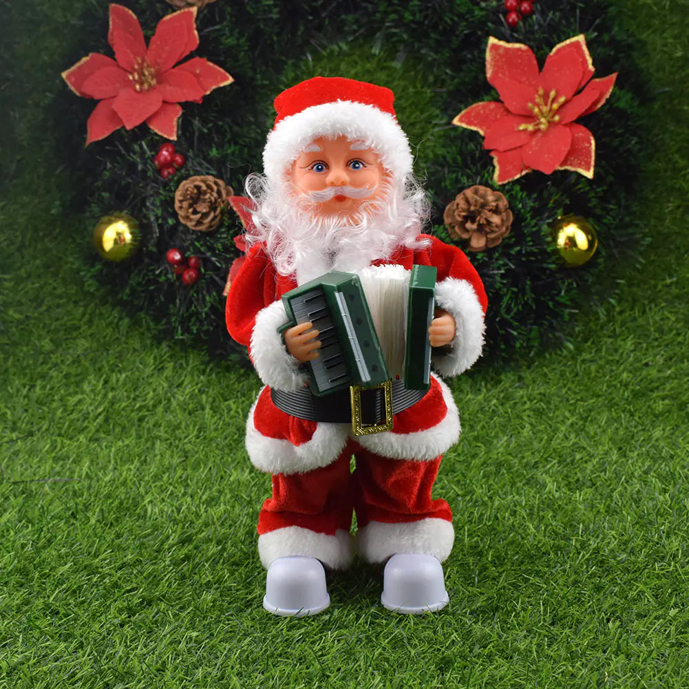 Santa Claus figurine holding an accordion on a grassy background with decorative flowers and ornaments.