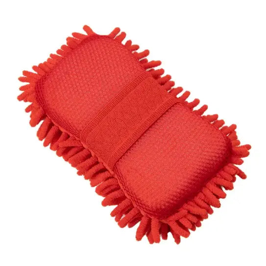 Red microfiber cleaning pad on a white background