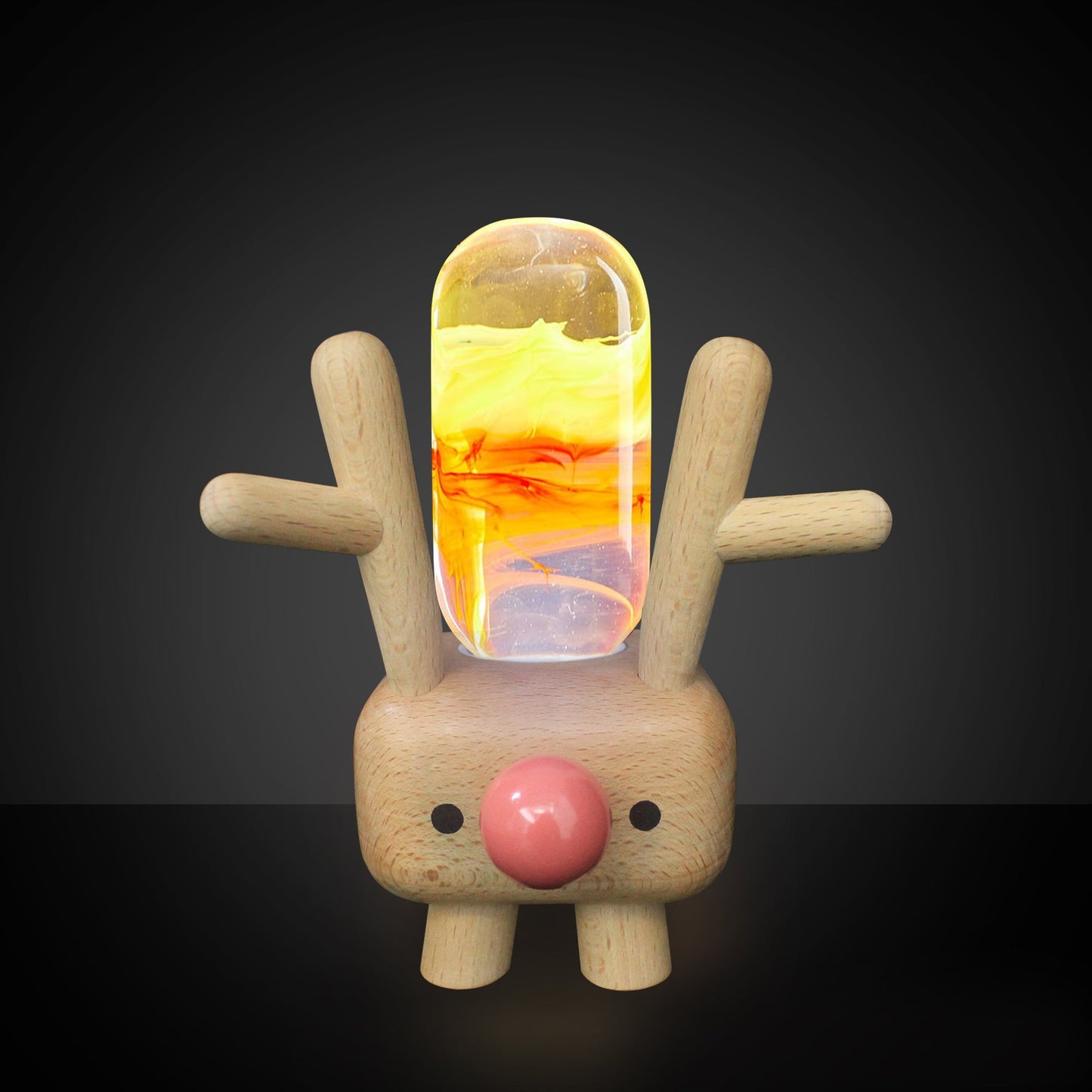 Wooden rabbit-shaped lamp with a glass cover on a dark background