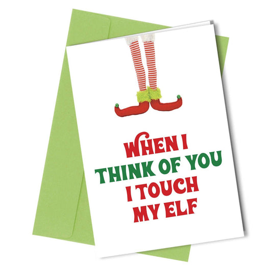 Card with elf design and text 'When I think of you I touch my elf' on a white background with a green envelope.