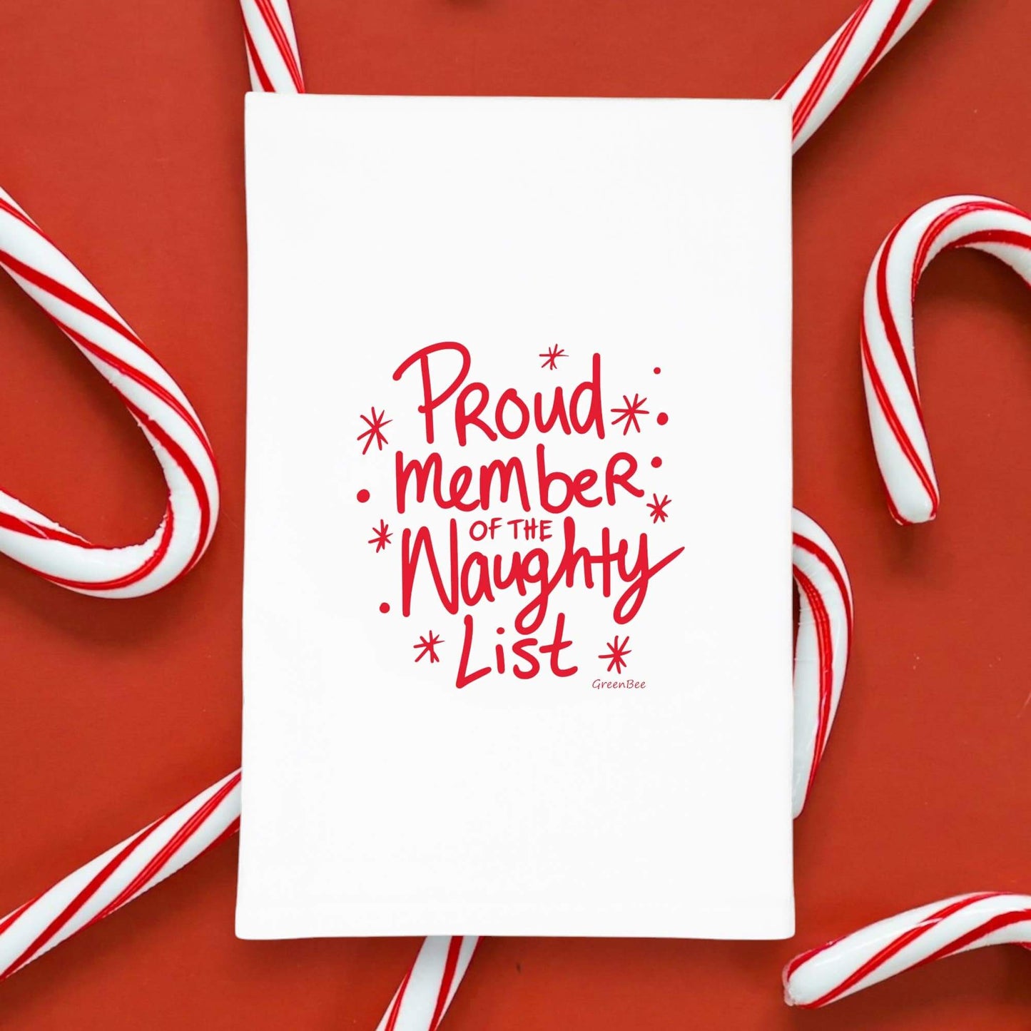 Naughty List Christmas Towel | Tea Towel | Kitchen Tea Towel featuring 'Proud member of the Naughty List' text on a white background.