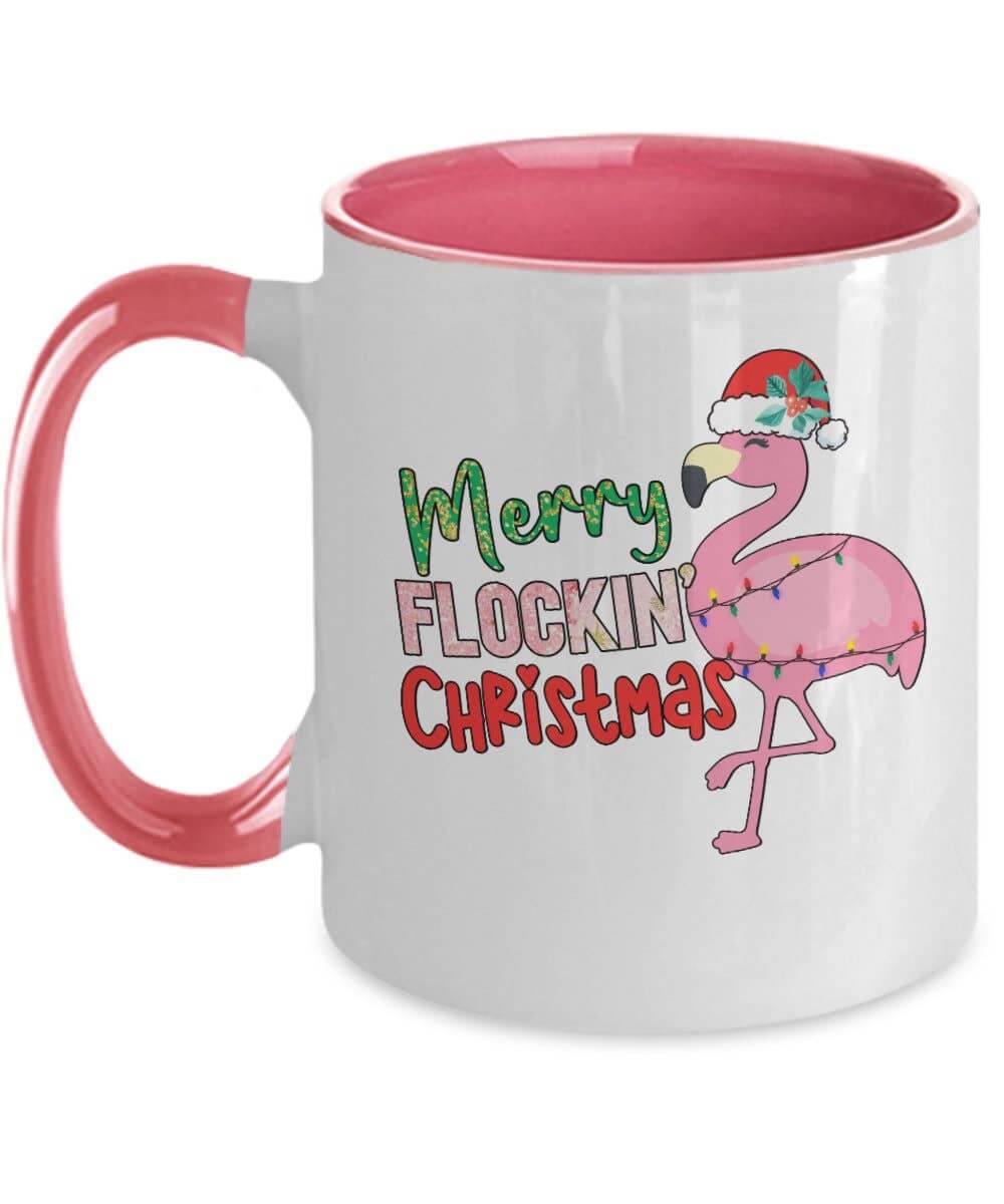 Mug with a flamingo design and 'Merry Flocking Christmas' text on a white background
