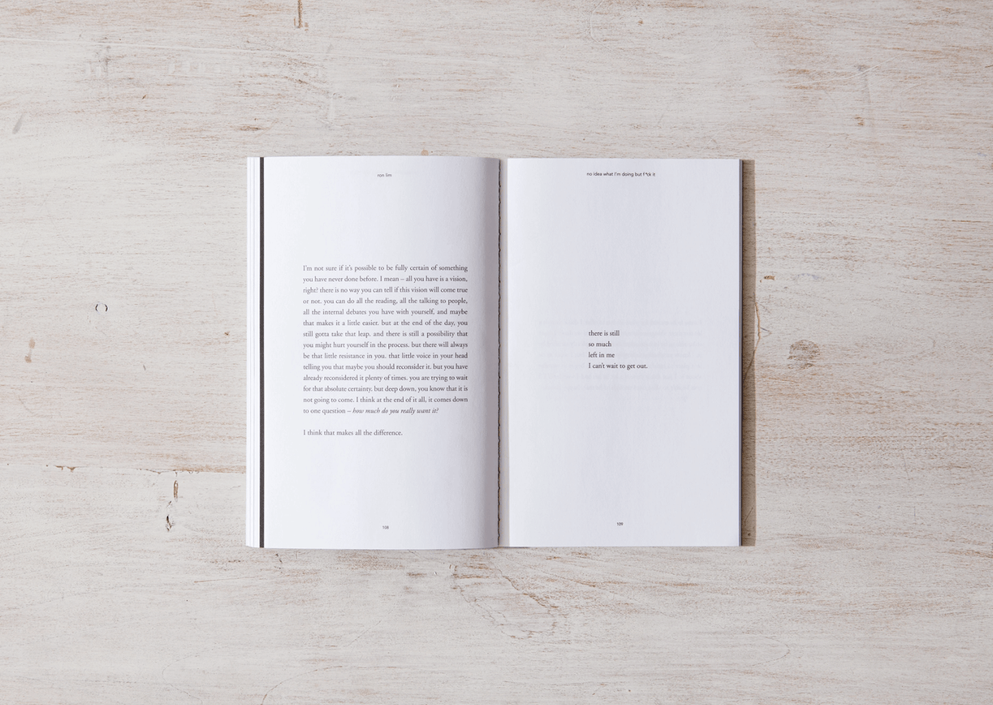 Open book on a light wooden surface