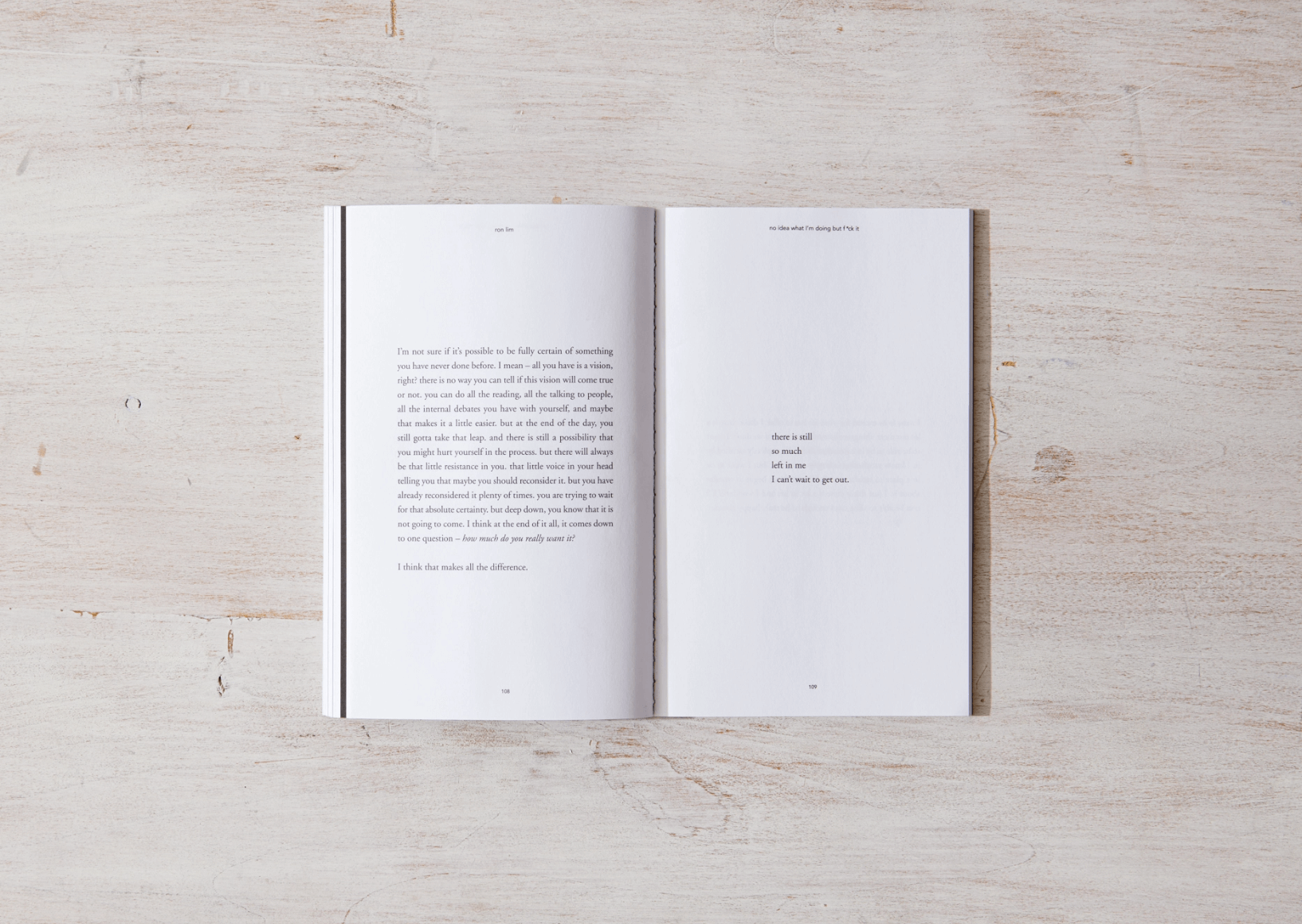 Open book on a light wooden surface