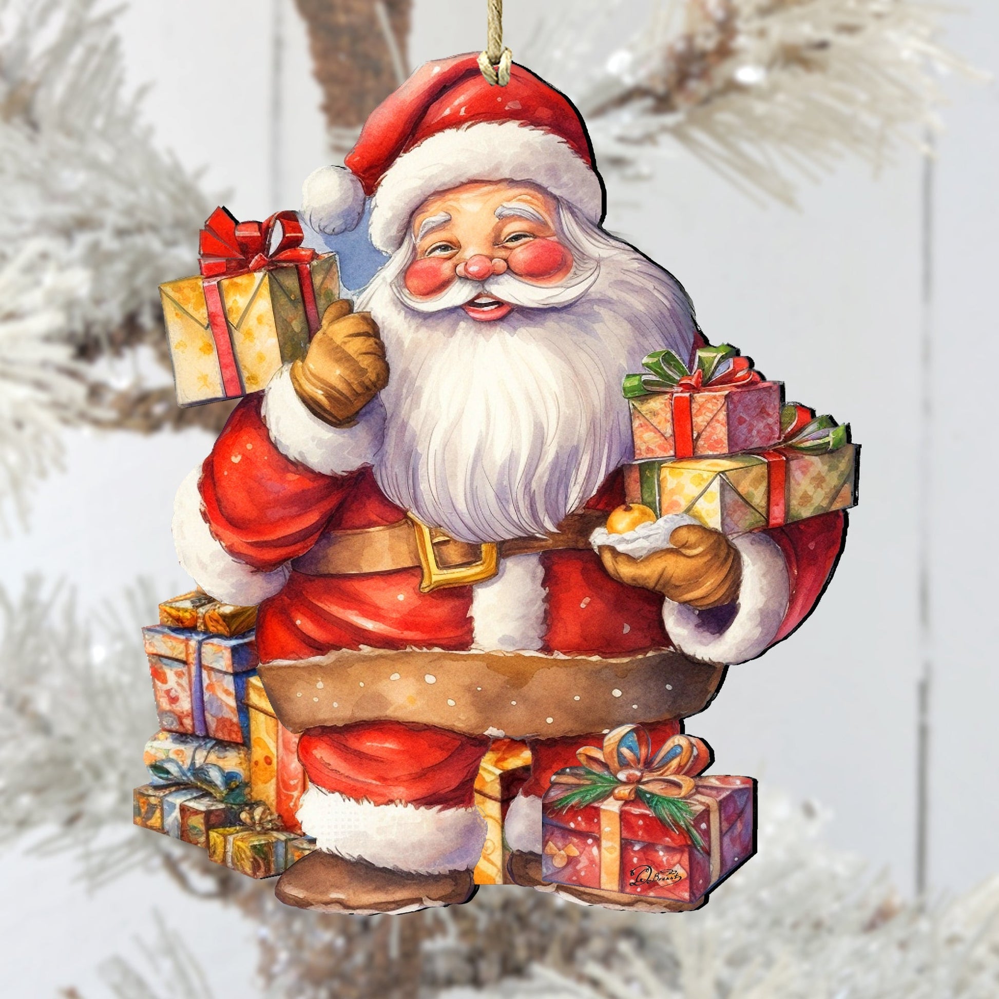 Decorative Christmas ornament of Santa Claus with gifts against a white background