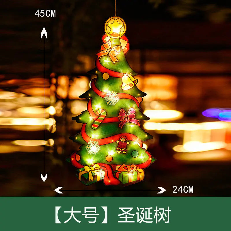 Decorative Christmas tree with lights and ornaments on a blurred background