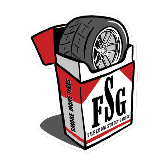 Sticker design with a tire on top of a box labeled 'FSG' (Freedom Street Garage) on a white background.