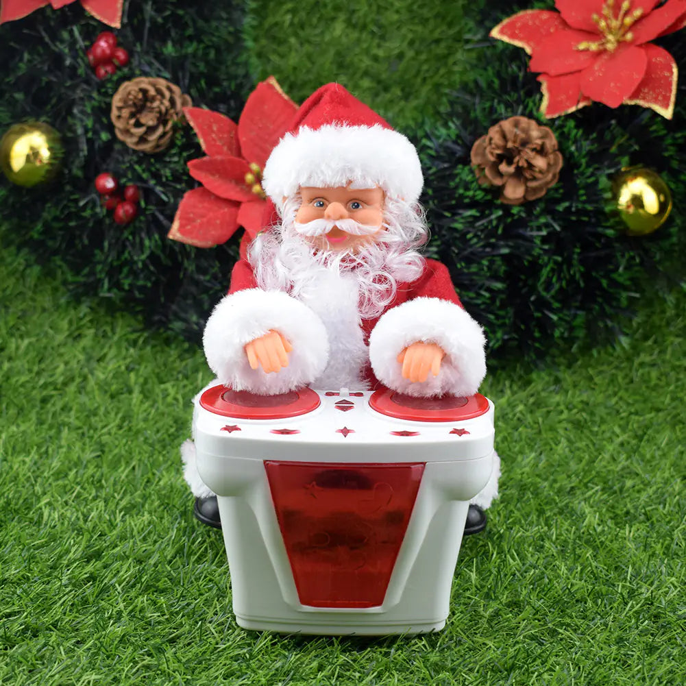 Santa Claus figurine on a toy car with Christmas decorations in the background